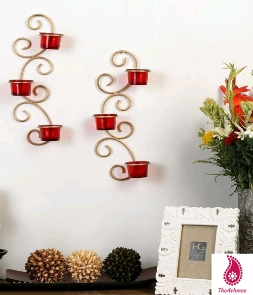 Metallic Gold Wall Sconce with Red and Clear Glasses